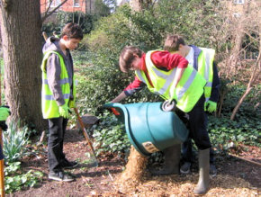 Volunteers laying woodchips at Kilmorey Mausoleum